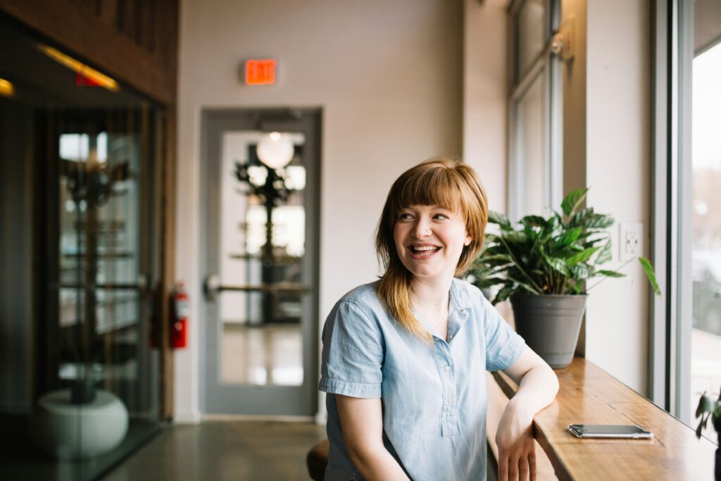 woman smiling in cafe